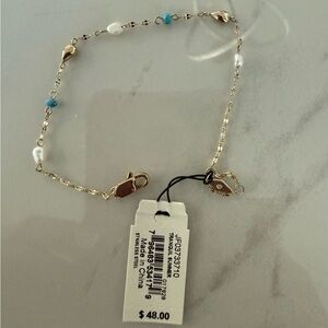Fossil Gold Bracelet with Blue and White Accents